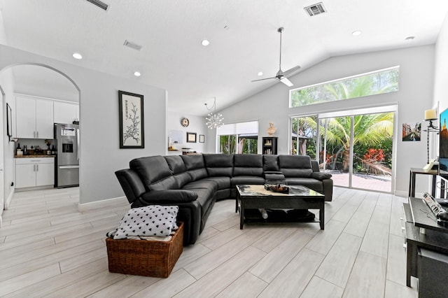 5822 Saddle Trail Ln, Lake Worth, FL 33449 - living room with arched walkways, ceiling fan, recessed lighting, high vaulted ceiling, and light wood-style floors