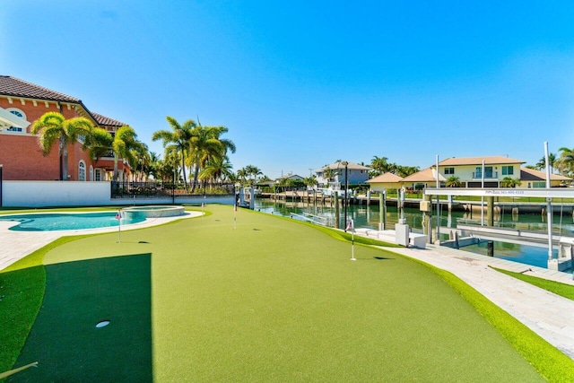 view of community featuring a residential view and a water view