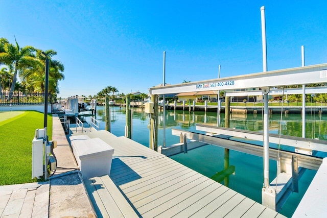 dock area featuring a water view