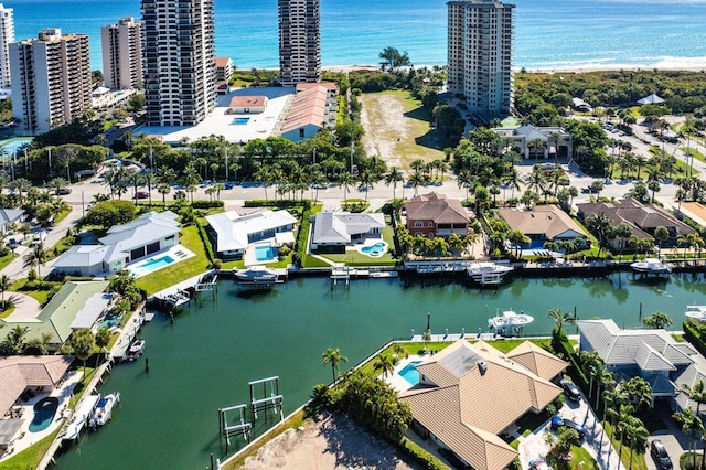 aerial view featuring a residential view and a water view