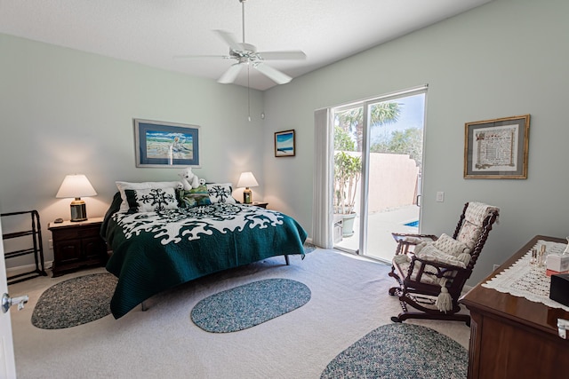 bedroom with carpet flooring, a textured ceiling, ceiling fan, and access to outside