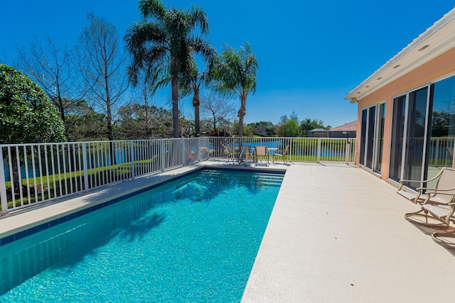 view of swimming pool featuring a fenced in pool