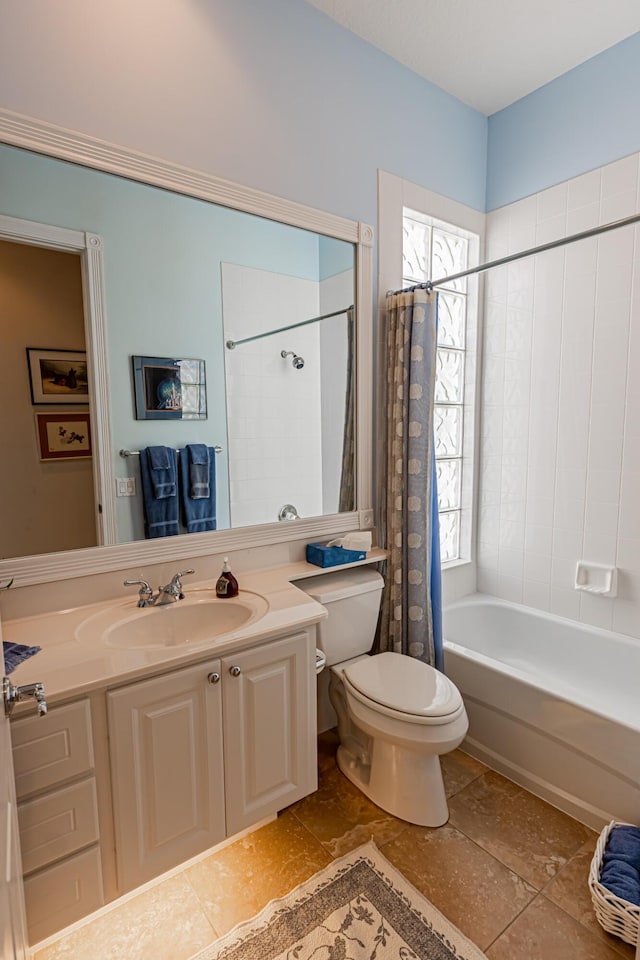 full bath with toilet, shower / bath combo, and vanity