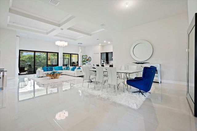 dining area with visible vents, baseboards, a high ceiling, an inviting chandelier, and coffered ceiling