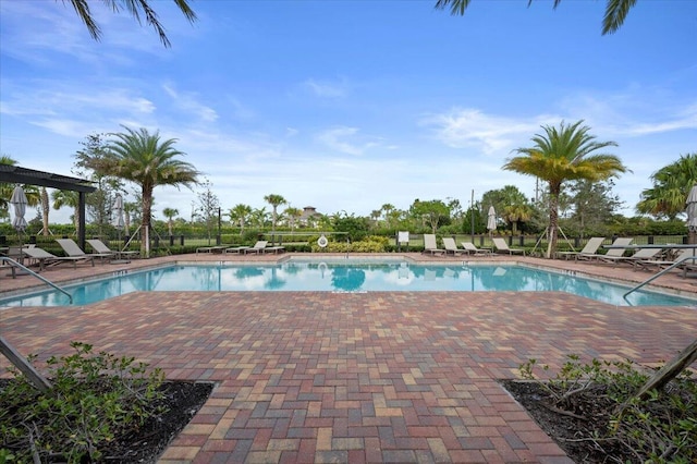 community pool featuring a patio