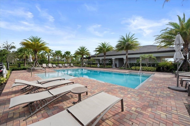 pool with a patio area