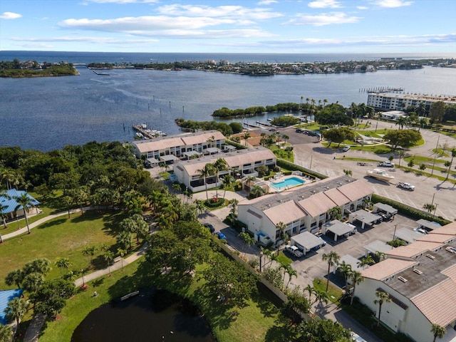 drone / aerial view with a water view