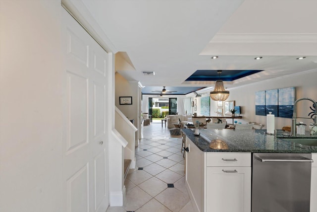 700 NE 20th Ln, Boynton Beach, FL 33435 - kitchen with crown molding, open floor plan, light tile patterned floors, a ceiling fan, and a sink