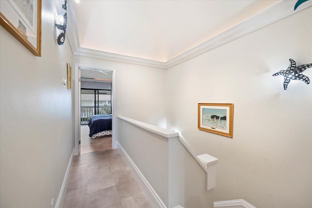 700 NE 20th Ln, Boynton Beach, FL 33435 - hallway featuring an upstairs landing and baseboards