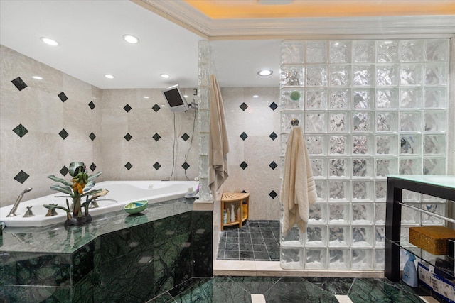700 NE 20th Ln, Boynton Beach, FL 33435 - full bathroom featuring tile walls, a garden tub, crown molding, and a walk in shower