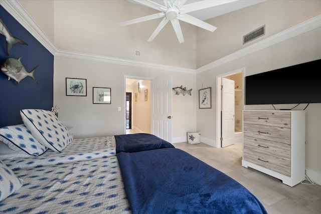 700 NE 20th Ln, Boynton Beach, FL 33435 - bedroom with visible vents, baseboards, a towering ceiling, and crown molding
