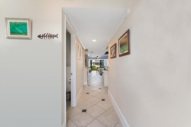 700 NE 20th Ln, Boynton Beach, FL 33435 - corridor with recessed lighting, baseboards, light tile patterned flooring, and ornamental molding