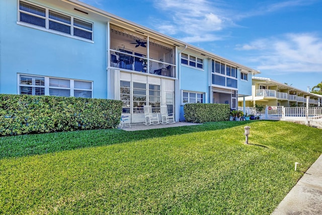 view of property with fence