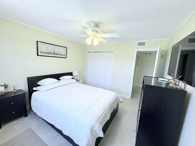 7365 NW 18th St Unit 107, Margate, FL 33063 - bedroom featuring ceiling fan and a textured ceiling