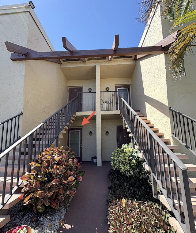 7365 NW 18th St Unit 107, Margate, FL 33063 - property entrance with stucco siding