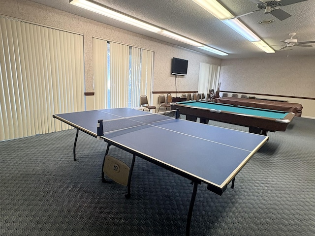 7365 NW 18th St Unit 107, Margate, FL 33063 - recreation room with carpet flooring, a ceiling fan, billiards, a textured wall, and a textured ceiling