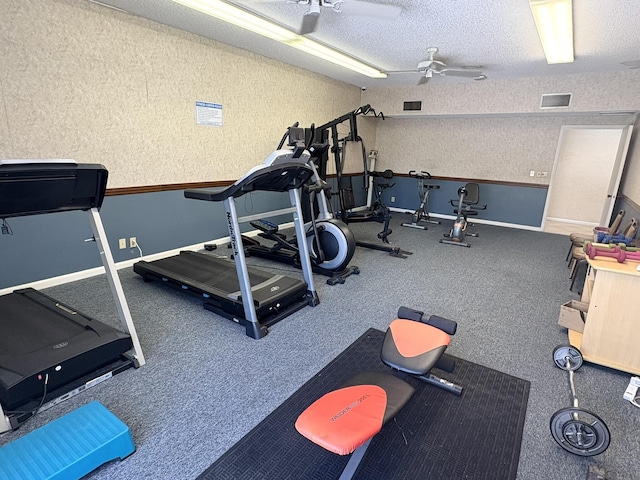 7365 NW 18th St Unit 107, Margate, FL 33063 - workout area featuring a ceiling fan, baseboards, and a textured ceiling