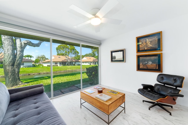 6438 Pointe Pleasant Cir, Delray Beach, FL 33484 - living area featuring a water view, marble finish floors, and ceiling fan
