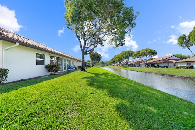 6438 Pointe Pleasant Cir, Delray Beach, FL 33484 - view of grassy yard with a water view