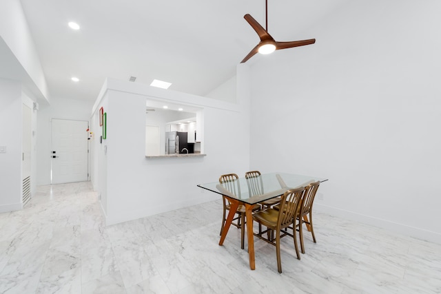 6438 Pointe Pleasant Cir, Delray Beach, FL 33484 - dining room with a ceiling fan, vaulted ceiling, light marble finish floors, baseboards, and recessed lighting