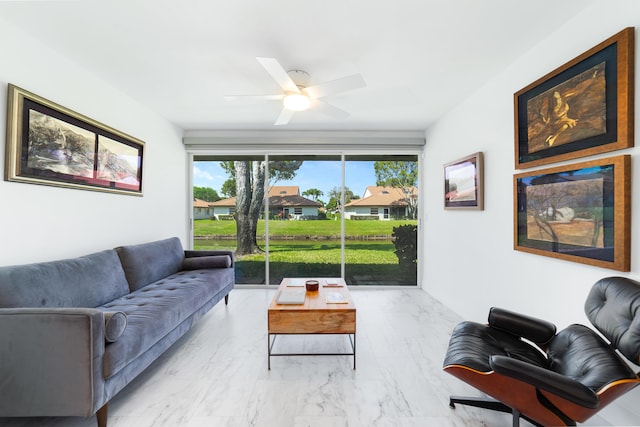 6438 Pointe Pleasant Cir, Delray Beach, FL 33484 - living area with ceiling fan and marble look tiles
