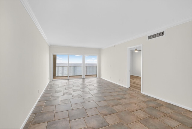 3101 S Ocean Blvd Unit 1002, Highland Beach, FL 33487 - spare room featuring crown molding and baseboards