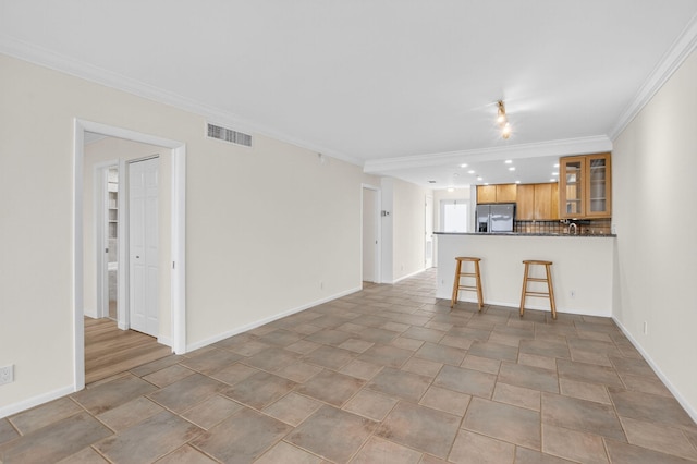 3101 S Ocean Blvd Unit 1002, Highland Beach, FL 33487 - unfurnished living room featuring ornamental molding and baseboards