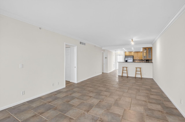 3101 S Ocean Blvd Unit 1002, Highland Beach, FL 33487 - unfurnished living room featuring crown molding and baseboards
