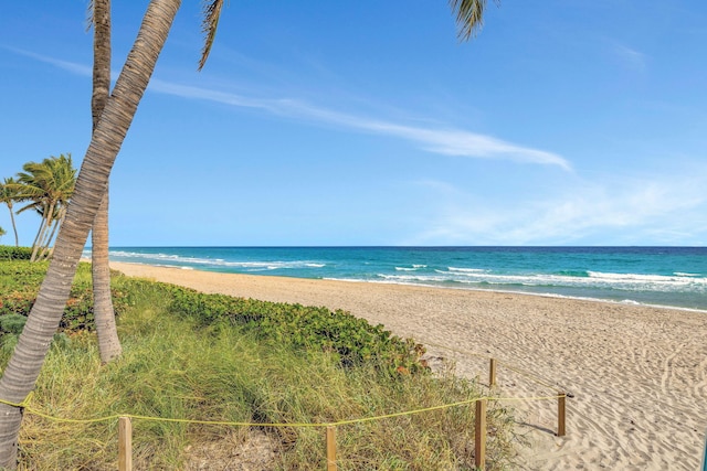 view of water feature with a beach view