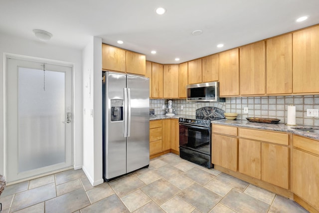 3101 S Ocean Blvd Unit 1002, Highland Beach, FL 33487 - kitchen with appliances with stainless steel finishes, light stone countertops, backsplash, recessed lighting, and light brown cabinetry