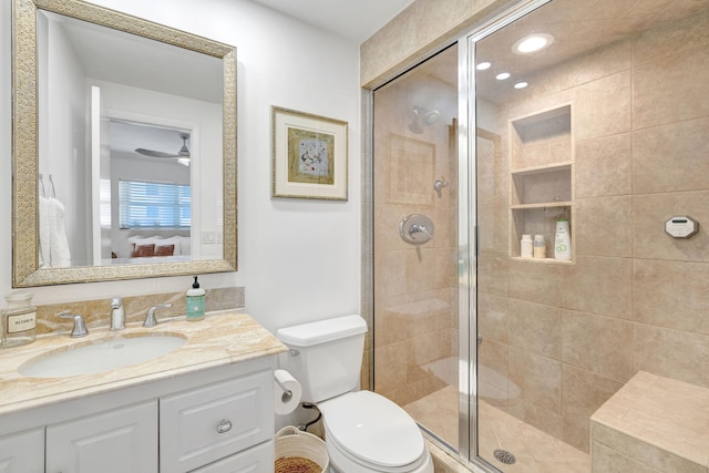 3101 S Ocean Blvd Unit 1002, Highland Beach, FL 33487 - bathroom featuring connected bathroom, vanity, a shower stall, and toilet