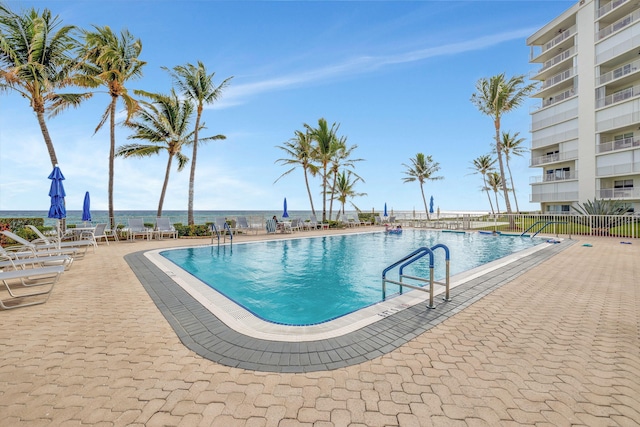 3101 S Ocean Blvd Unit 1002, Highland Beach, FL 33487 - community pool with a patio area
