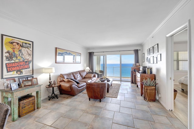 living room featuring baseboards, a water view, and crown molding