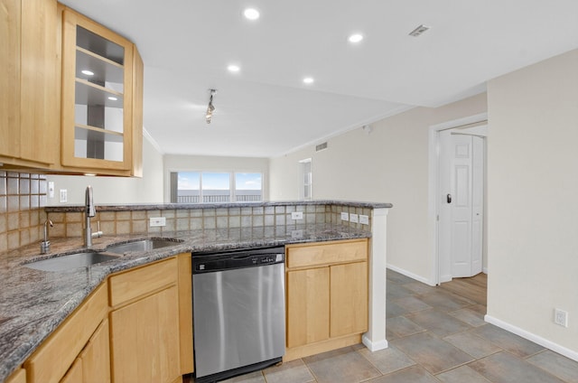 3101 S Ocean Blvd Unit 1002, Highland Beach, FL 33487 - kitchen featuring stainless steel dishwasher, a sink, light brown cabinetry, tasteful backsplash, and a peninsula