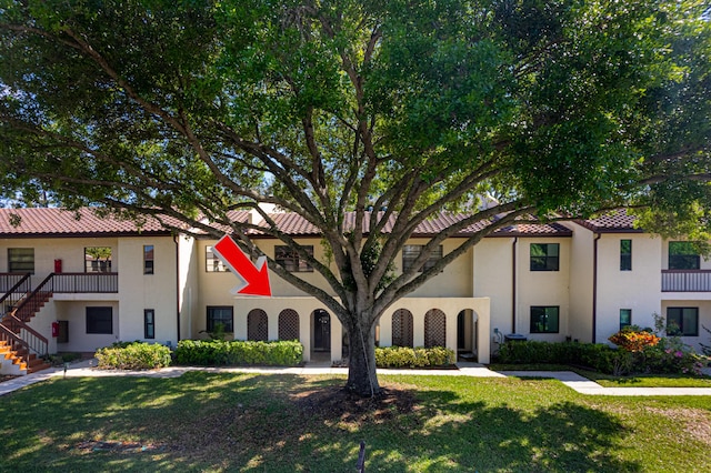 view of property with stairs