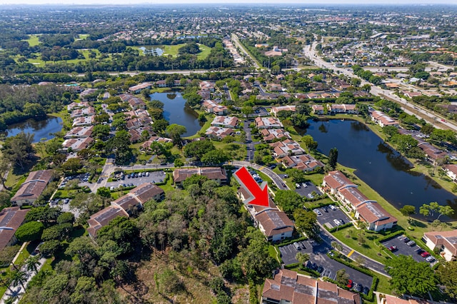 aerial view featuring a water view and a residential view