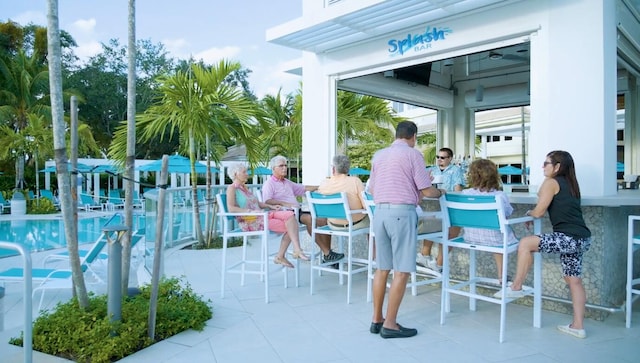 15 Southport Ln Unit E, Boynton Beach, FL 33436 - view of patio featuring outdoor dry bar