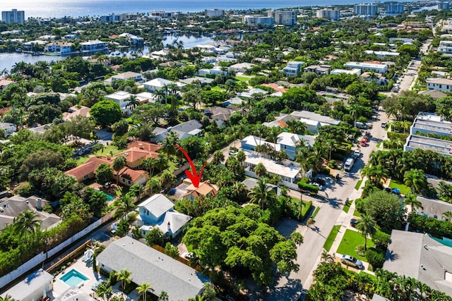 aerial view featuring a city view and a water view