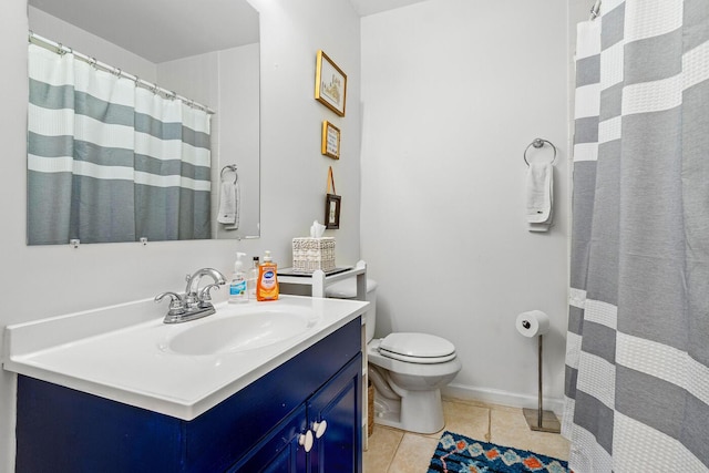 bathroom featuring tile patterned floors, a shower with curtain, toilet, baseboards, and vanity