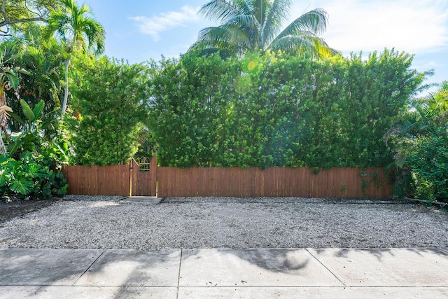 view of patio / terrace featuring a gate and fence