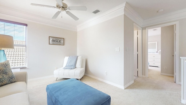 sitting room featuring visible vents, crown molding, baseboards, light carpet, and a ceiling fan