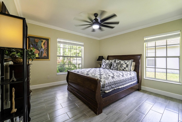 bedroom featuring baseboards, wood tiled floor, ceiling fan, and crown molding