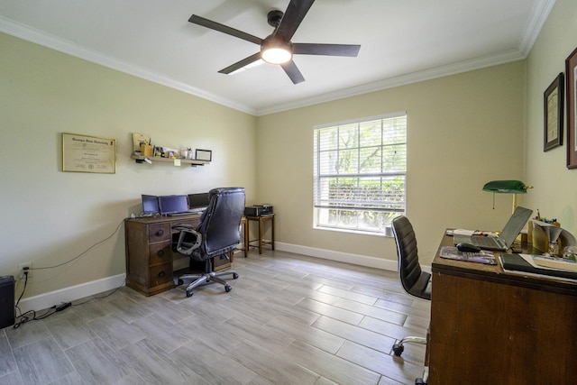 office with baseboards, light wood-style floors, a ceiling fan, and crown molding