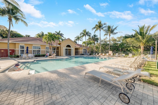 500 Scotia Dr Unit 106, Hypoluxo, FL 33462 - community pool featuring fence and a patio