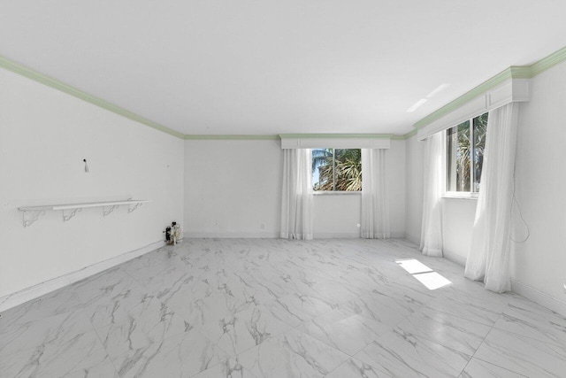2000 S Ocean Blvd Unit 301, Delray Beach, FL 33483 - unfurnished room with a healthy amount of sunlight, crown molding, and baseboards