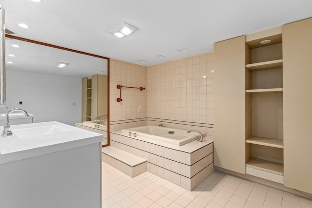 2000 S Ocean Blvd Unit 301, Delray Beach, FL 33483 - bathroom with two vanities, recessed lighting, a sink, tile patterned floors, and a bath