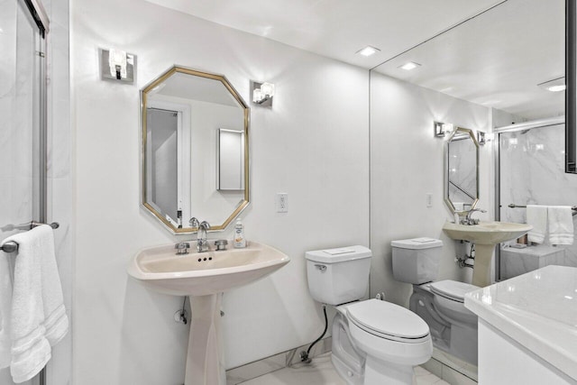 2000 S Ocean Blvd Unit 301, Delray Beach, FL 33483 - bathroom with a sink, an enclosed shower, toilet, and marble finish floor