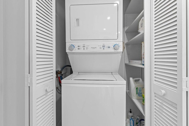 2000 S Ocean Blvd Unit 301, Delray Beach, FL 33483 - washroom with laundry area and stacked washer and clothes dryer