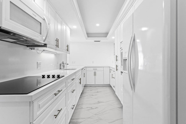 2000 S Ocean Blvd Unit 301, Delray Beach, FL 33483 - kitchen featuring white appliances, recessed lighting, a sink, white cabinets, and marble finish floor