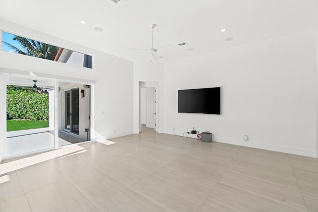 unfurnished living room featuring visible vents, recessed lighting, baseboards, and ceiling fan